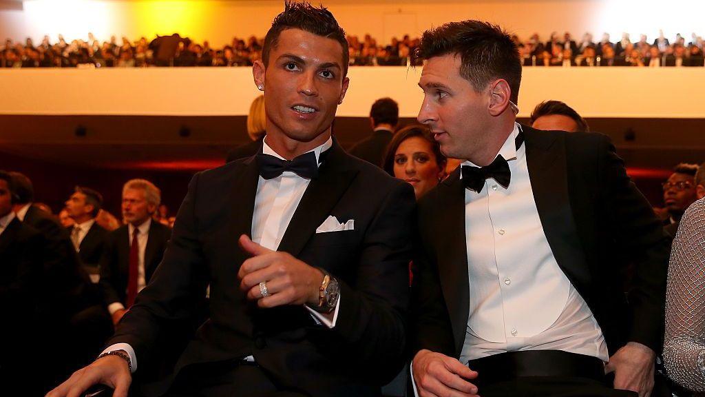 Cristiano Ronaldo and Lionel Messi in smart attire at a ceremony