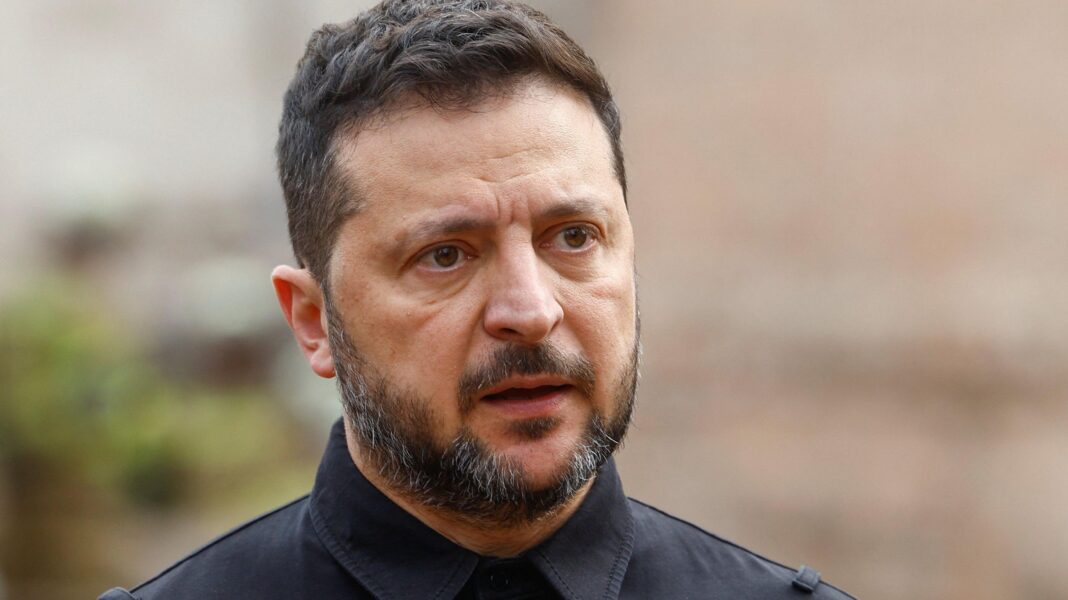 Analysis: Trump’s global headaches worsen weeks before crucial elections A close photo of a tired looking man, with a greying beard and dark hair wearing a black shirt.