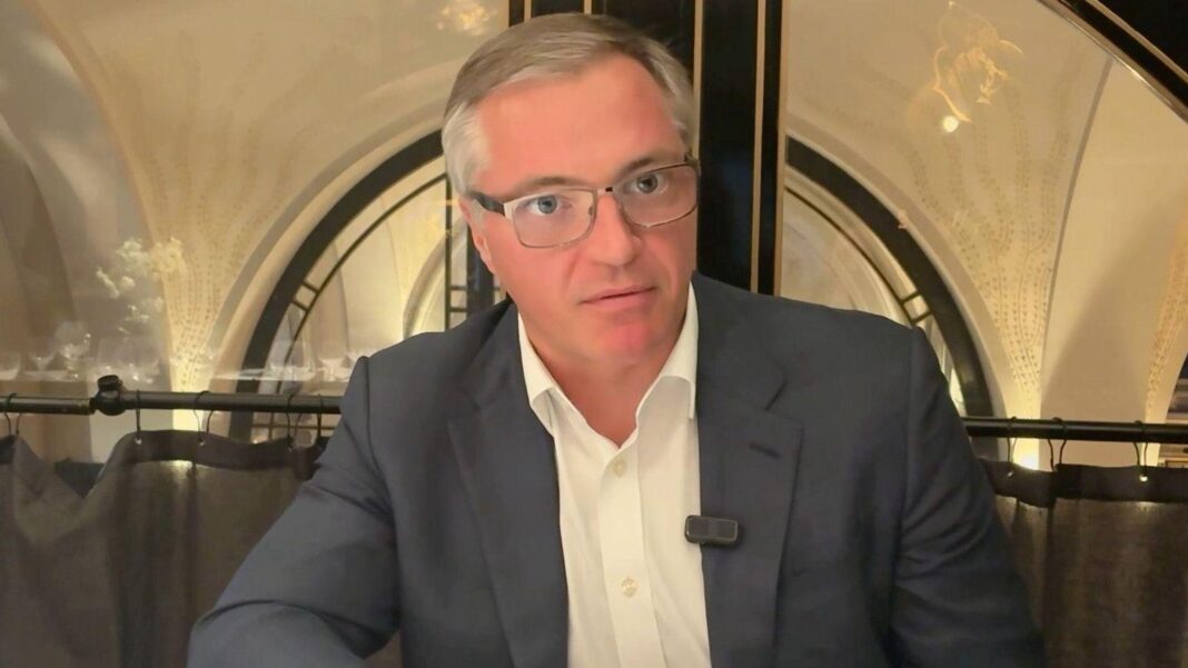 EU tariffs aimed at China hitting Ukraine, steel boss says Yuriy Ryzhenkov, chief executive of Metinvest, being interviewed by the BBC. He is wearing a blue suit jacket and a white shirt. He has grey hair and is wearing glasses.