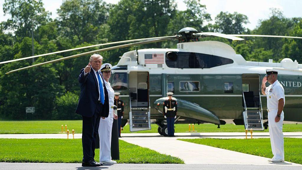 President Donald Trump gestures before boarding Marine One departs after a Cabinet meeting at Camp David on July 31, 2026 in Thurmont, Maryland.