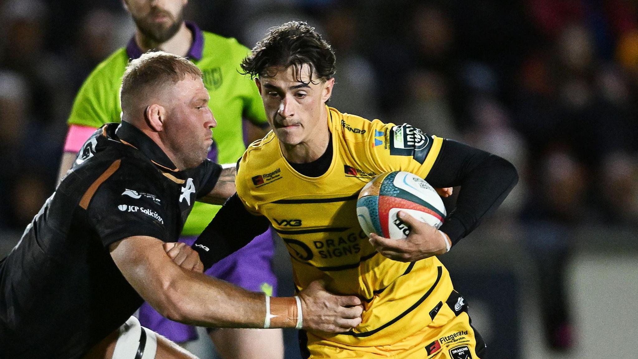 Che Hope carries the ball for Dragons against Ospreys