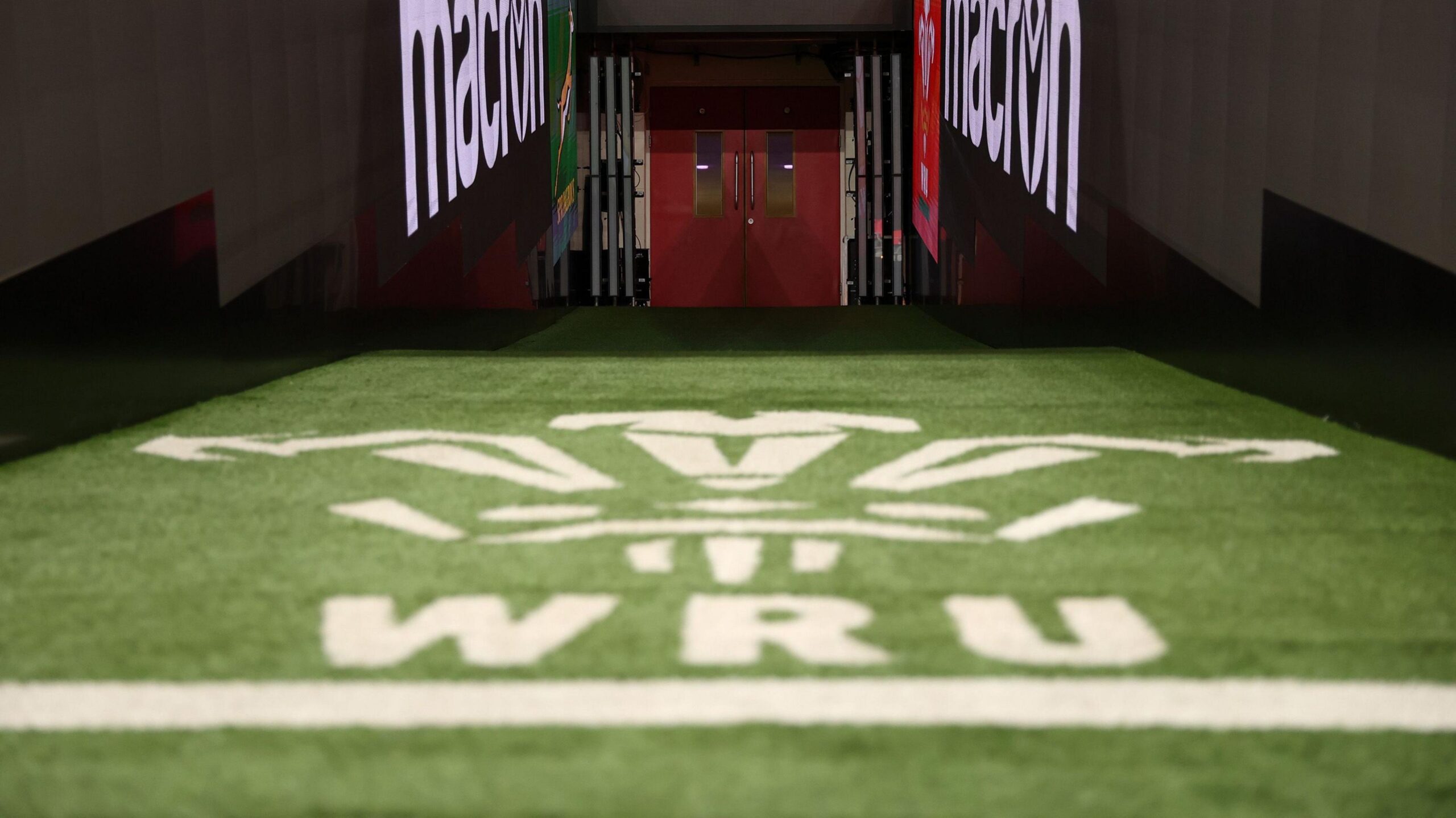 WRU logo on grass in front of player's tunnel at the Principality Stadium