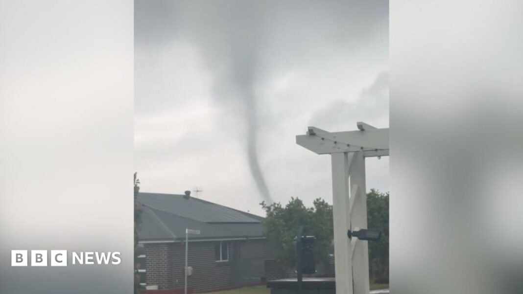 Rare tornado whips through small Australian town image