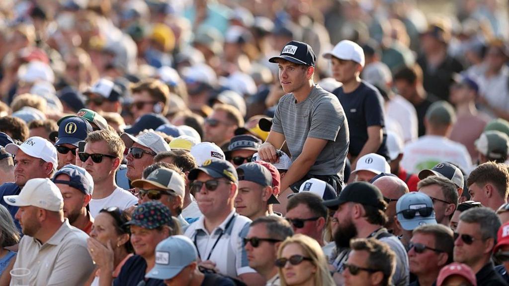 Fans watch on during play at the 154th Open at Royal Birkdale
