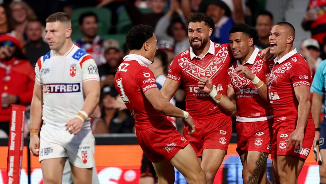 McDermott seeks fix as England fight to save their World Cup George Williams looks dejected as Tonga celebrate