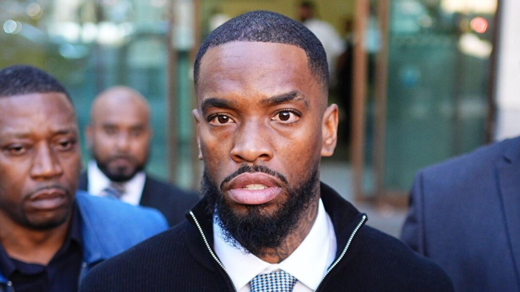 Ivan Toney, wearing a white shirt, black jumper and tie, is pictured outside court.