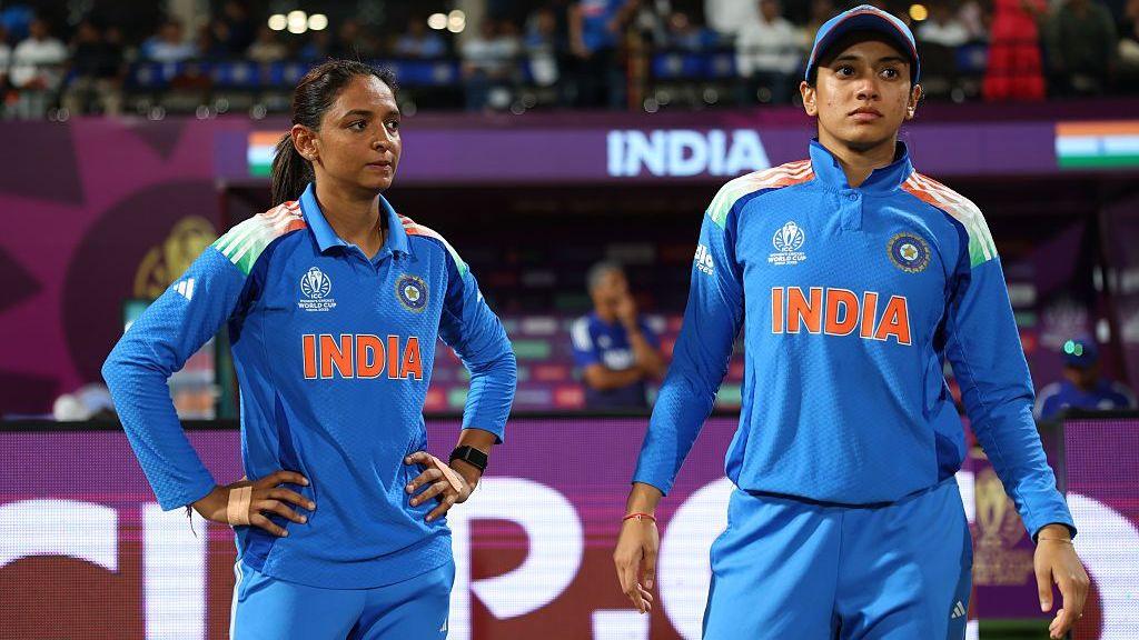 Harmanpreet Kaur of India speaks to team mate Smriti Mandhana ahead of the second innings of the ICC Women's Cricket World Cup India 2025 match