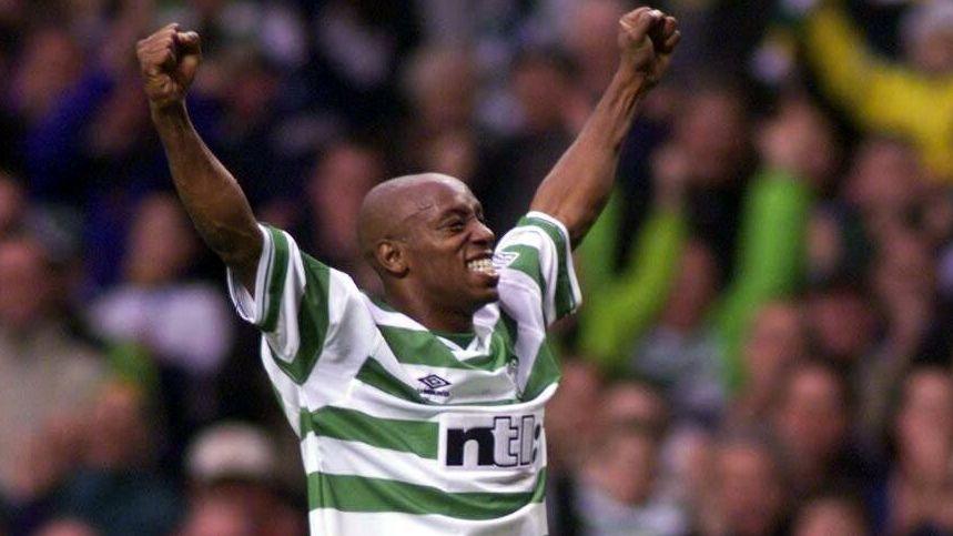 Ian Wright in the green and white hoops of Celtic celebrates after scoring his first goal for the club against Kilmarnock
