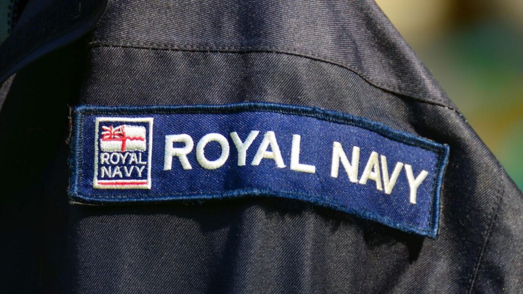 A close shot of Royal Navy badge
