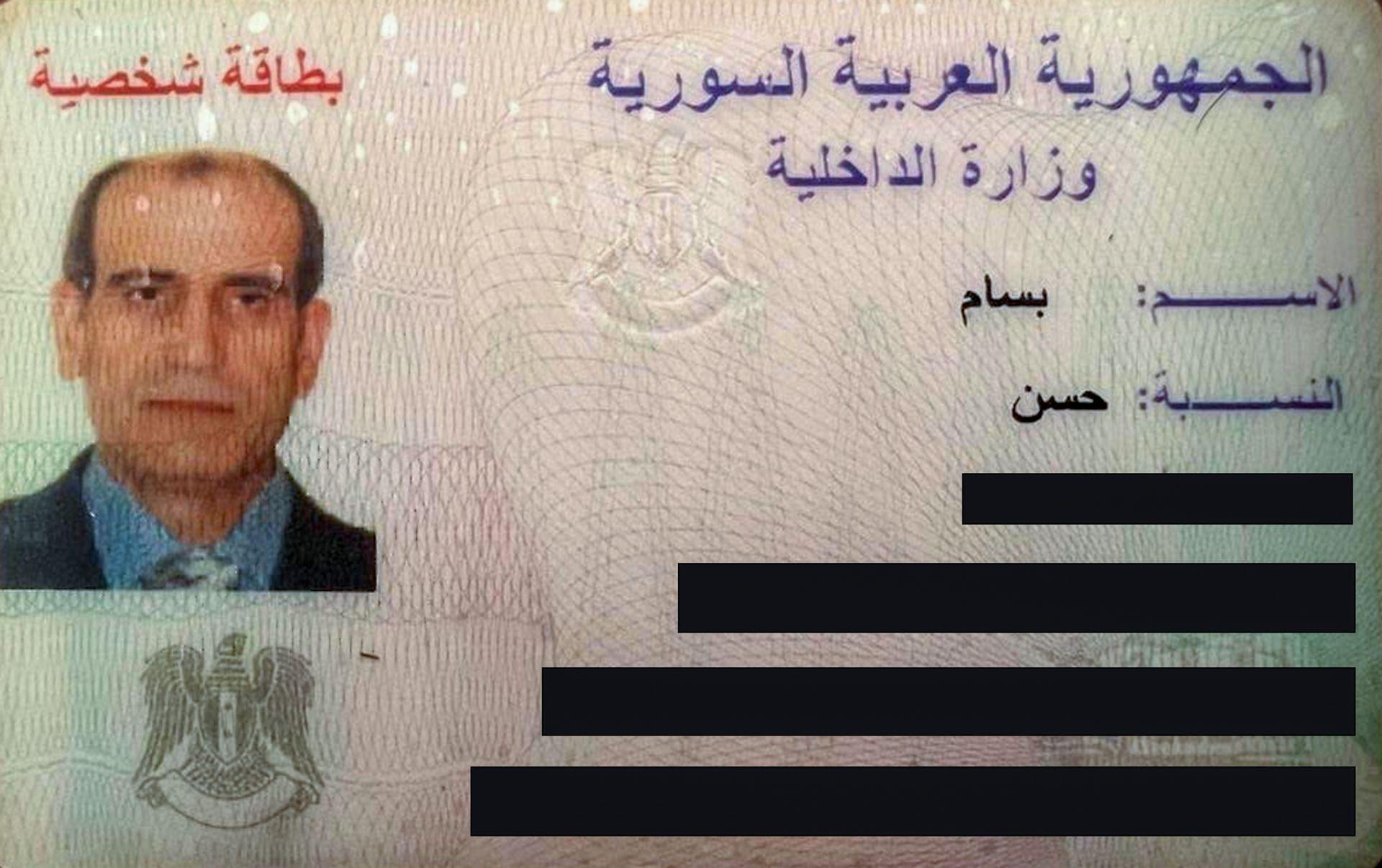 ID card showing Bassam al-Hassan (who is wearing a navy suit, blue shirt and has dark hair) with Arabic writing and a crest, and some personal ID details redacted by the BBC.