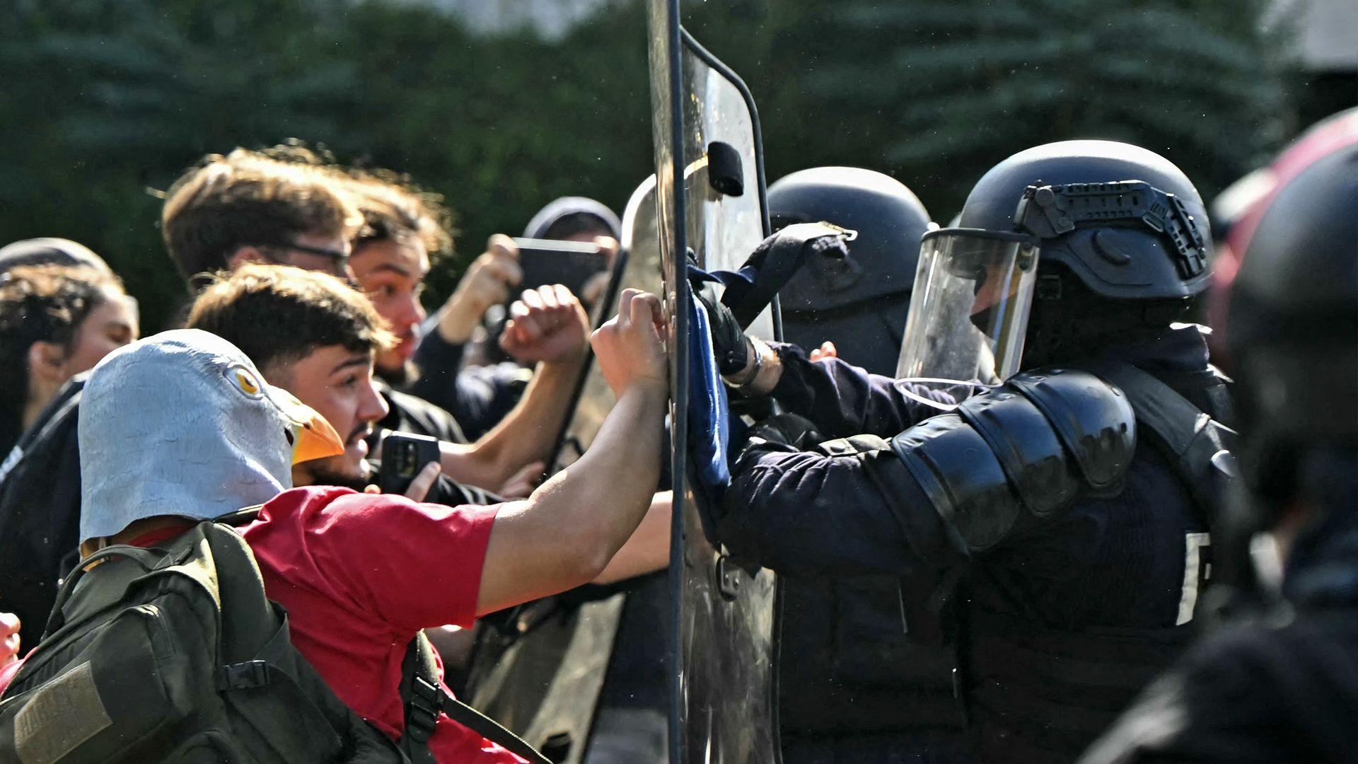 Anti-riot police officers face protesting students carrying out blockading action outside the secondary school Le Corbusier, in Aubervilliers, northern Paris on October 1, 2026.