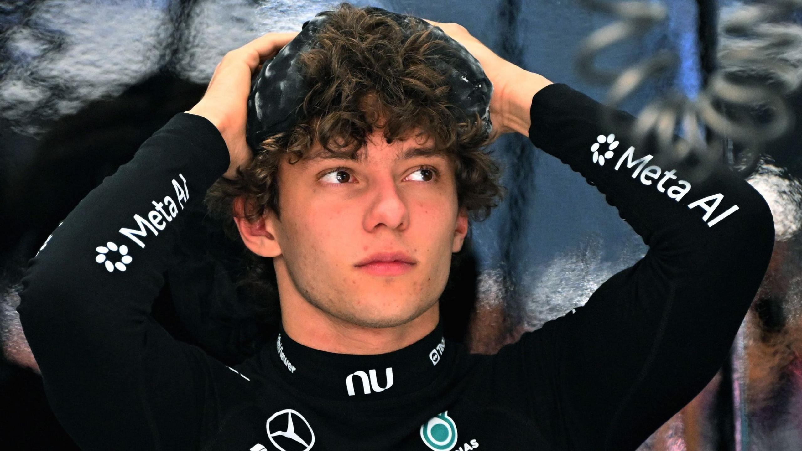 Mercedes' driver Kimi Antonelli with his hands on his head in the pits during US Grand Prix practice