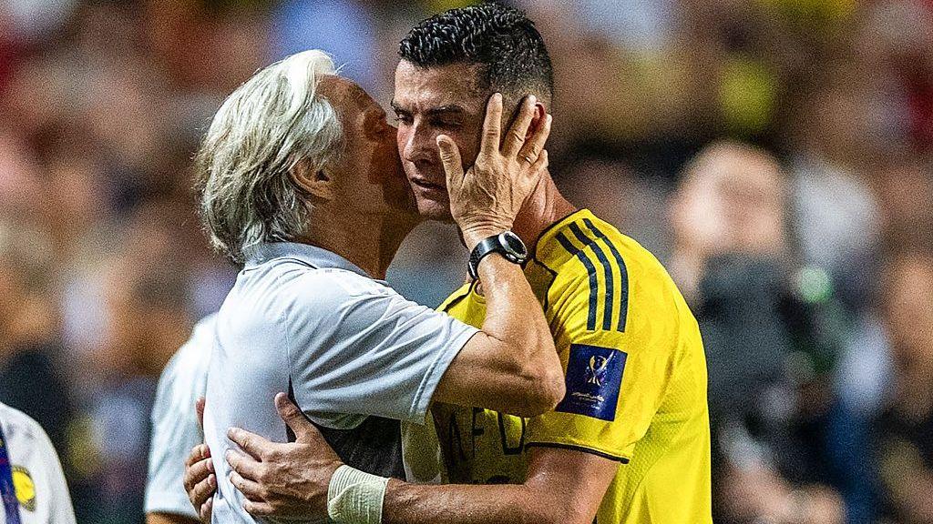 Jorge Jesus embraces Cristiano Ronaldo at Al-Nassr