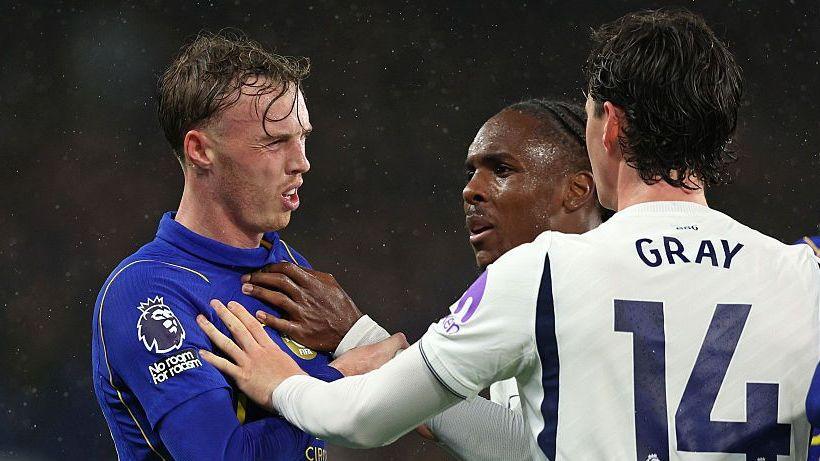 Cole Palmer pushes Spurs players after a late challenge