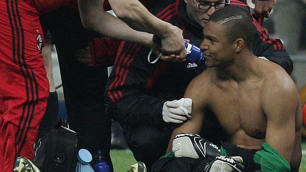 AC Milan goalkeeper Dida suffered burns to his shoulder when he was hit by a flare