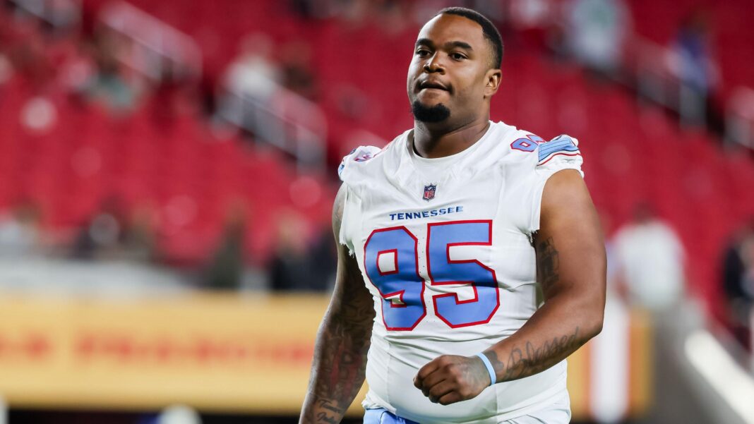 Jordan Elliott #95 of the Tennessee Titans