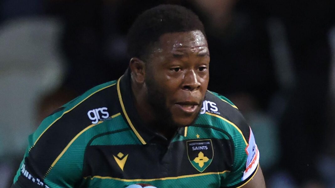 Manny Iyogun in a green, black and gold Northampton Saints jersey