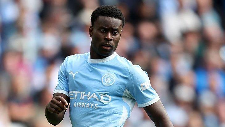 A photo of Marc Guehi playing for Manchester City.