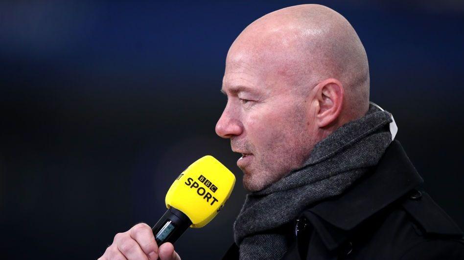 Alan Shearer speaks into a BBC microphone
