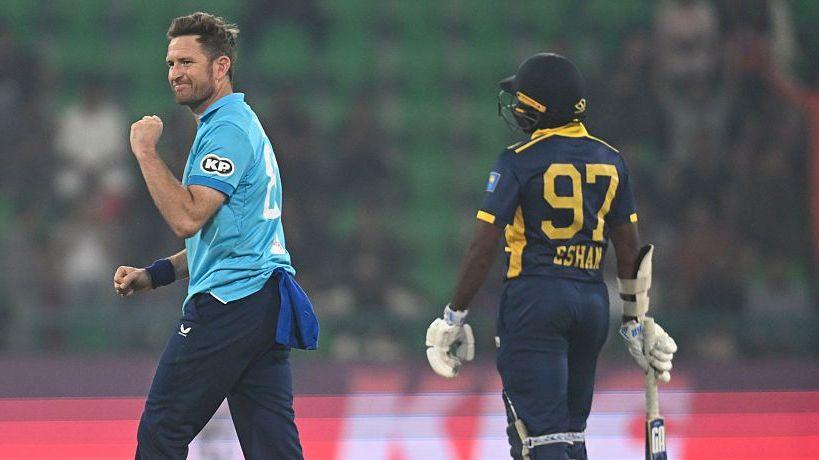 Liam Dawson celebrates a wicket for England