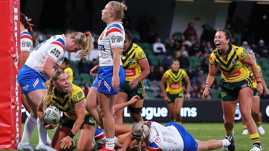 Australia players celebrate after scoring against England