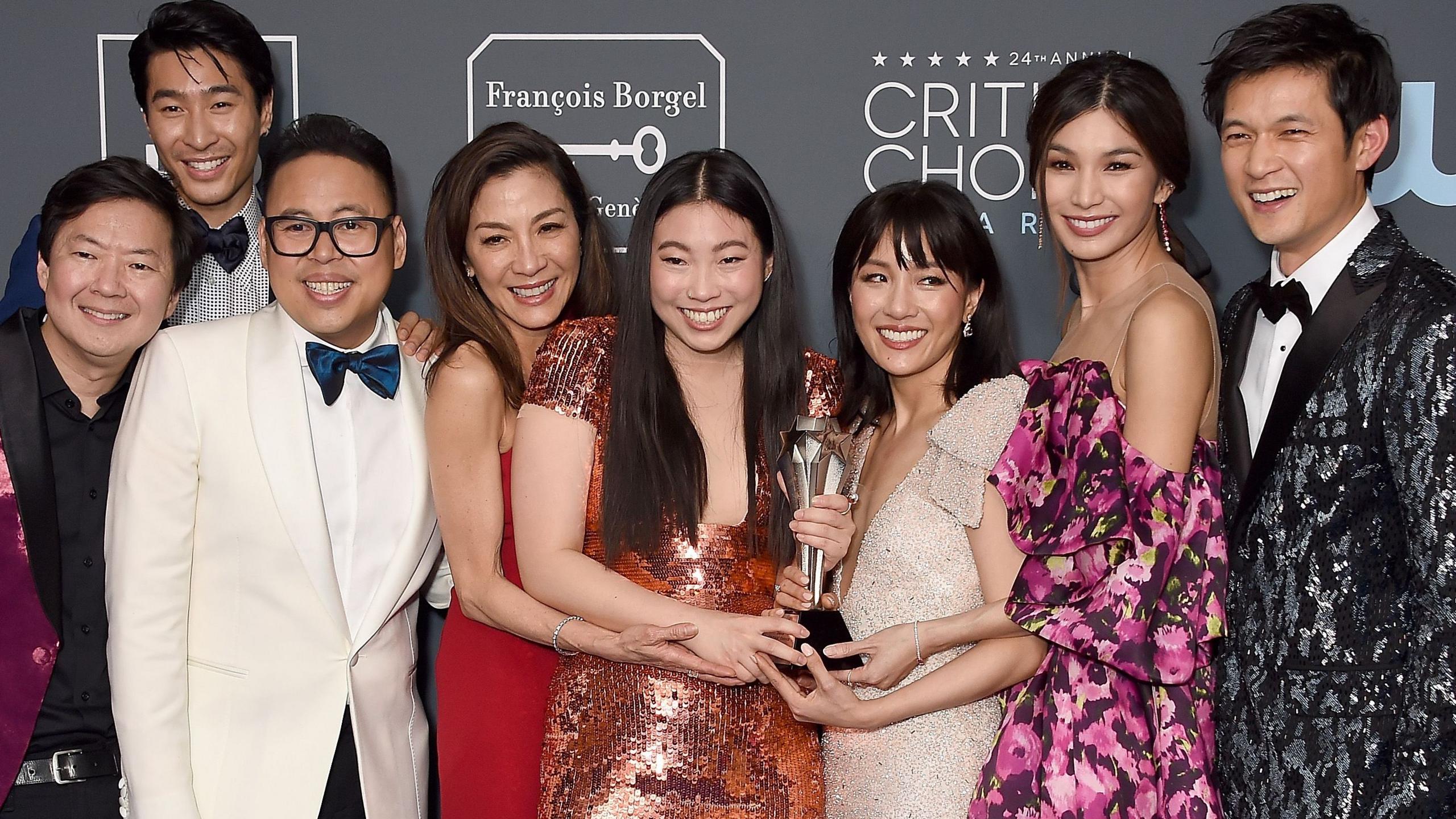 Ken Jeong, Chris Pang, Nico Santos, Michelle Yeoh, Awkwafina, Constance Wu, Gemma Chan, and Harry Shum Jr in evening dress at the 2019 Critics Choice Awards