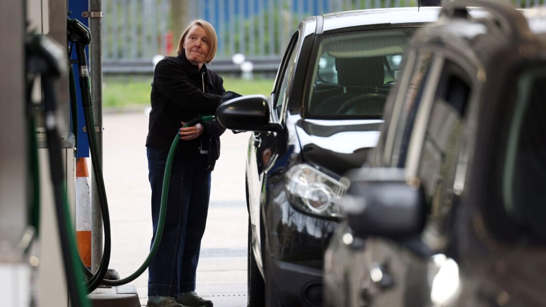 UK in talks with EU partners to release strategic fuel reserves if needed, BBC understands A woman fills her car up with diesel