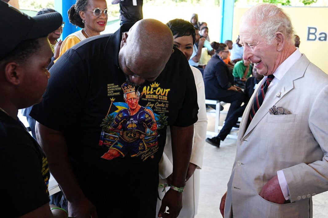 King Charles shows off dance moves on second day of Caribbean tour King Charles meets 12-year-old Sanai Miller and boxing coach Jermaine Gibson during a visit to The Bahamas Boxing Academy in Nassau. Gibson is wearing a black t-shirt with a cartoon version of Charles as a boxer on it.