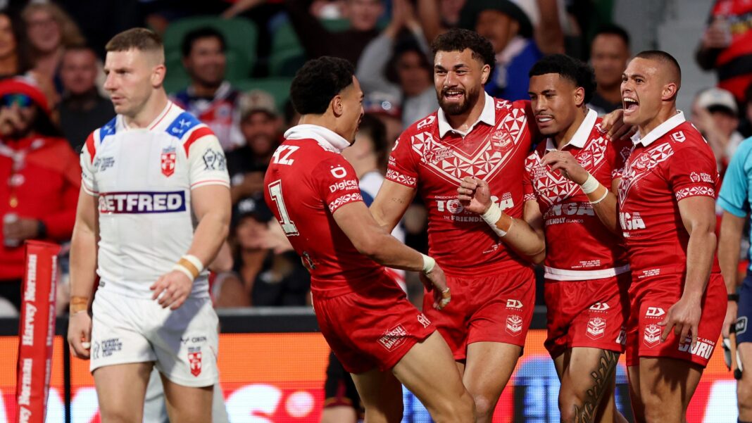 England unchanged to face France after Tonga defeat George Williams looks dejected as Tonga celebrate