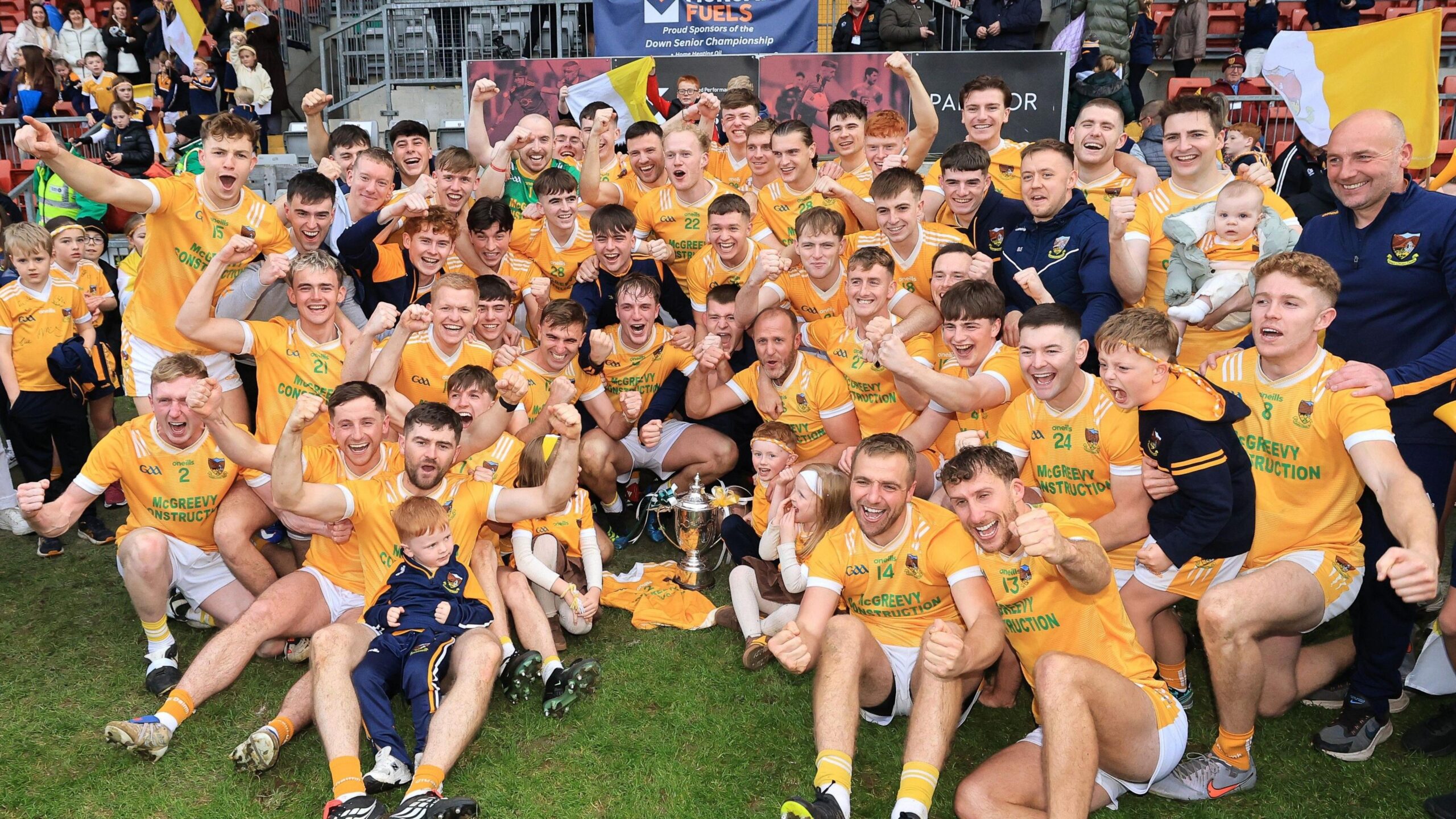 Clonduff celebrate with the trophy