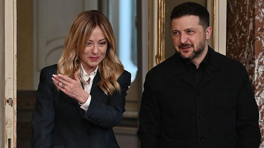Italian Premier Giorgia Meloni (L) and Ukrainian President Volodymyr Zelenskyy (R) arrive for a joint press conference at the end of their talks at Chigi Palace government office in Rome, Italy, on April 15, 2026