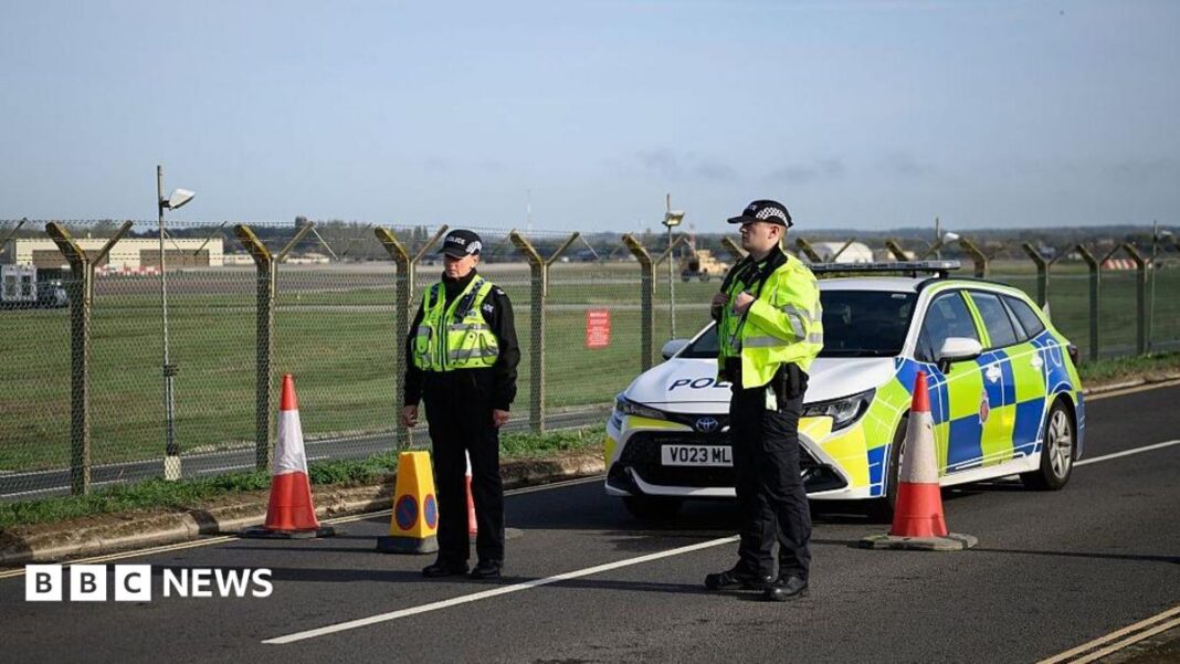 Two re-arrested on suspicion of assisting Iran intelligence after RAF Fairford incident Two re-arrested on suspicion of assisting Iran intelligence after RAF Fairford incident