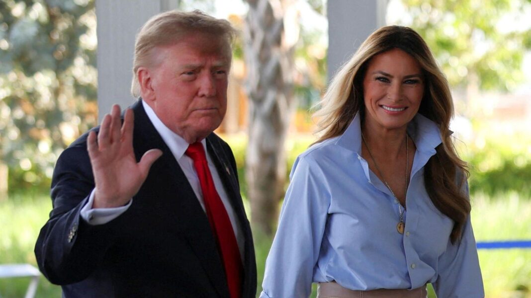 Obama attacks Trump as he campaigns for Democrats ahead of midterm elections Donald Trump waves as he walks next to a smiling Melania Trump