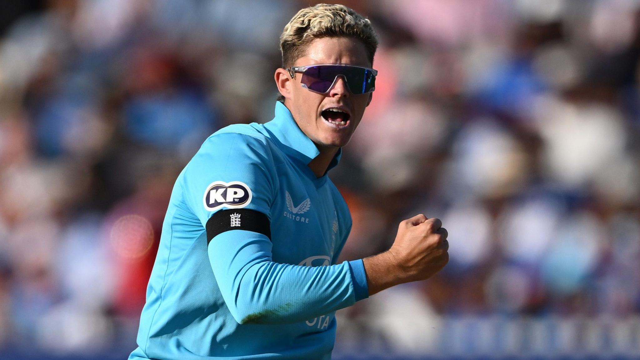 Jacob Bethell celebrates a wicket