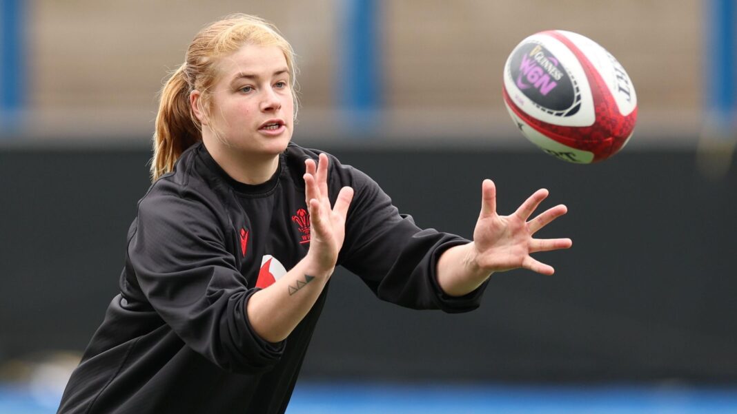 Wales make five changes as Lynn rewards bench Bethan Lewis in black Wales training top holds her hands forward ready to catch an approaching rugby ball