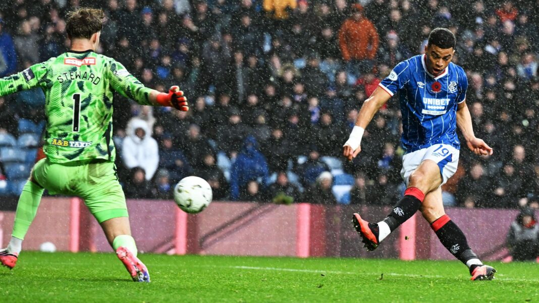 Kevin Kelsy scores for Rangers against St Johnstone