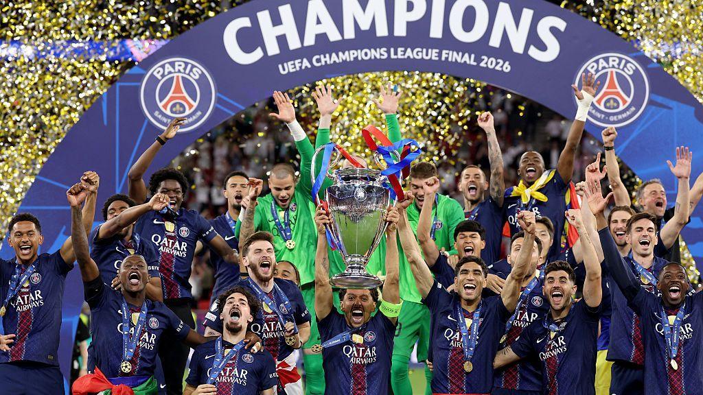 Paris St-Germain lift the Champions League trophy after beating Arsenal in the 2025-26 Champions League Final