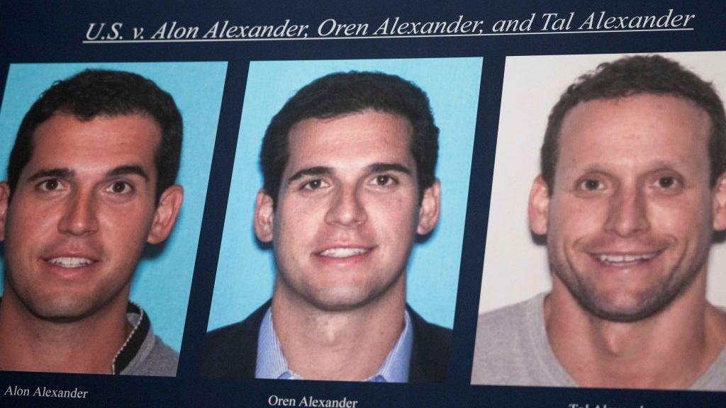 The three Alexander brothers shown on a justice department charging document