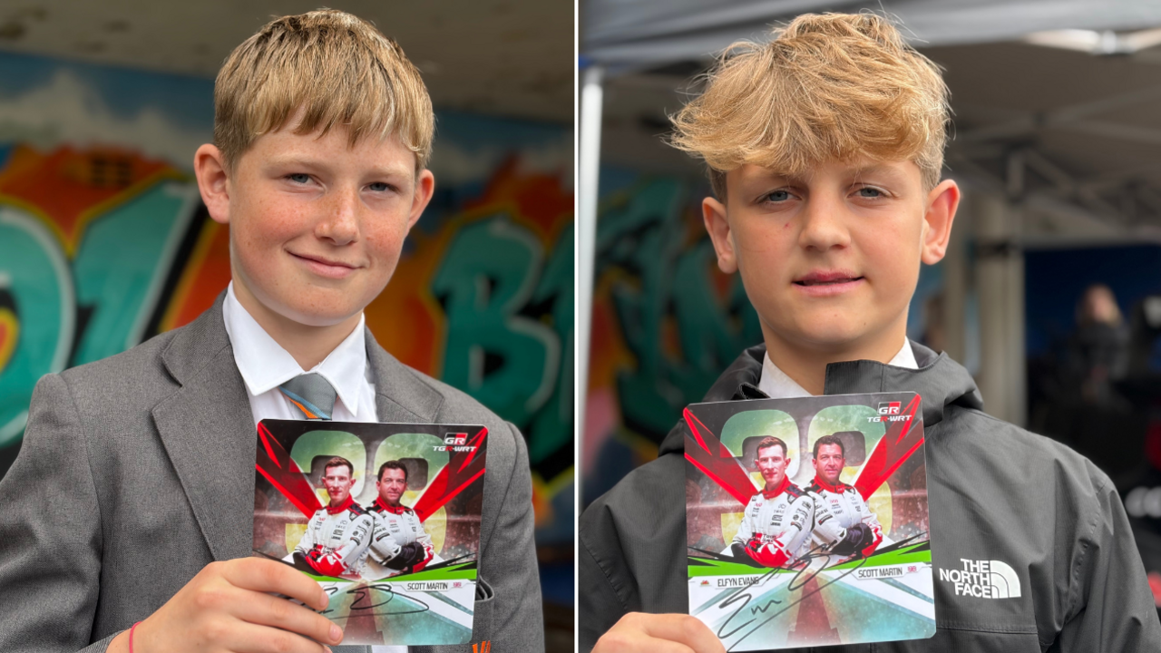 Two pictures side by side of two blonde teenage boys. The one on the left is wearing a grey shcool uniform, the one on the right is wearing a black North Face jacket. Both are holding up signed flyers.