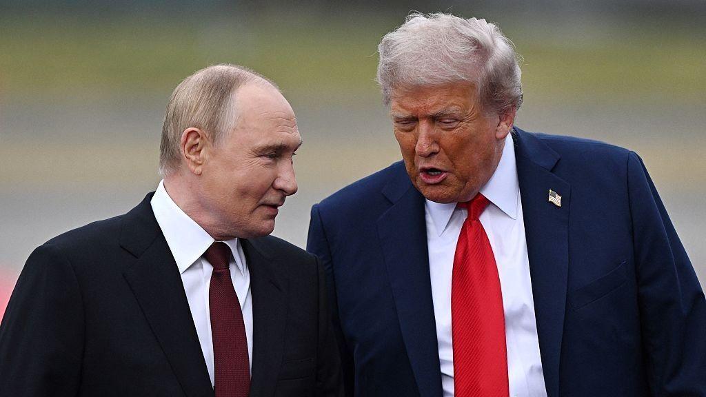 Putin and Trump talking at the Alaska summit in 2025