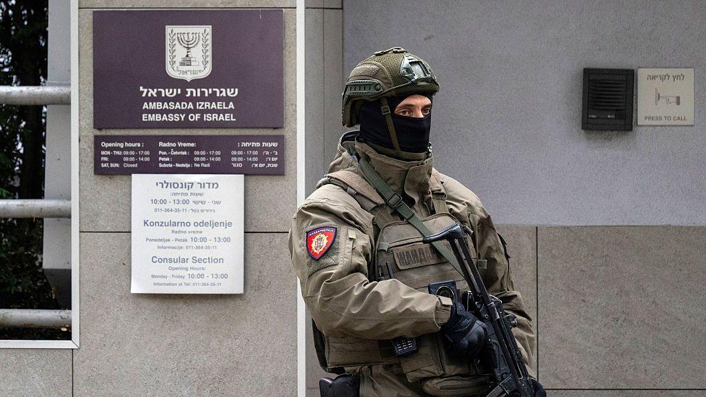 A member of Serbia's Gendarmerie stands guard at the entrance to the Israeli embassy in Belgrade on October 28, 2026.