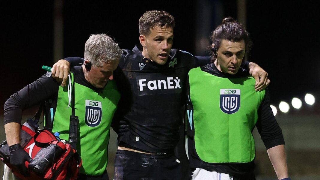 Ospreys and Wales scrum-half Kieran Hardy is helped from the field in the first half of his side's win at Dragons