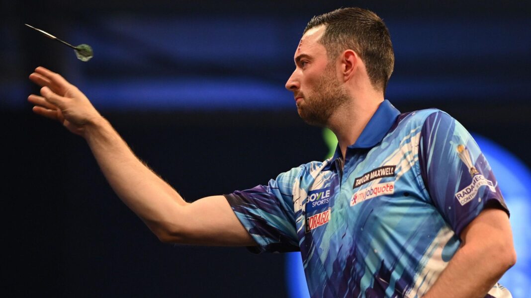 Luke Humphries throws a dart during his match against Niels Zonneveld at the World Grand Prix