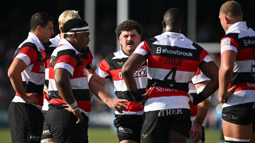 Saracens management letting players down – Care Saracens players stand around with hands on hips