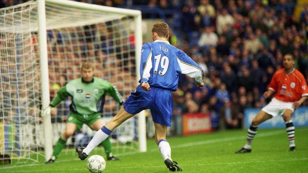 Tore Andre Flo controls the ball