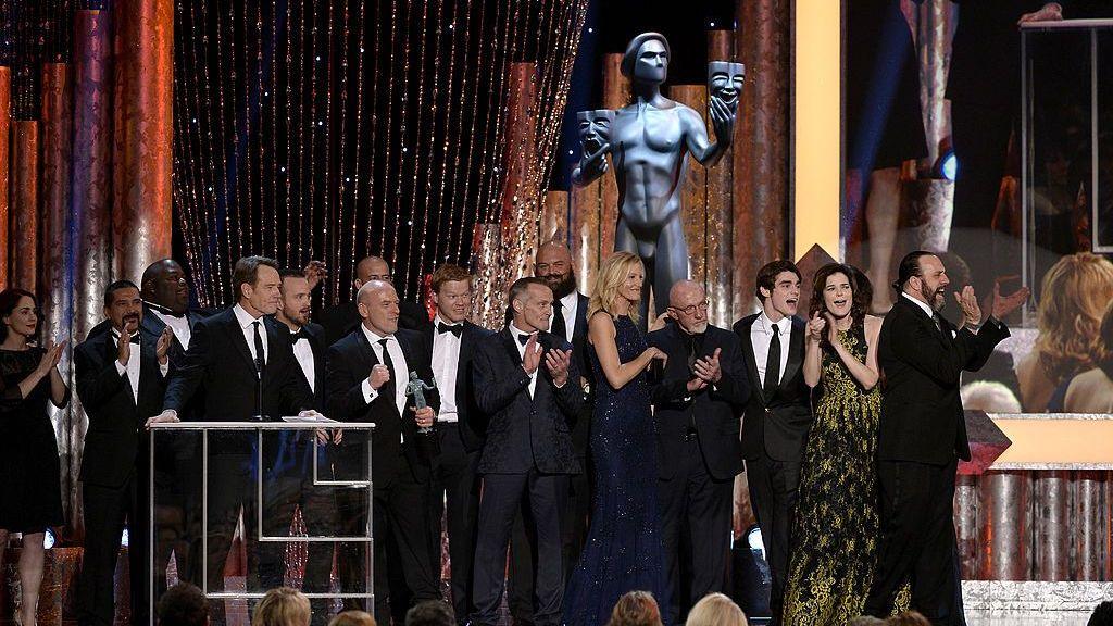 Actor Bryan Cranston (C) accepts the Outstanding Performance by an Ensemble in a Drama Series award for 'Breaking Bad' onstage during the 20th Annual Screen Actors Guild Awards at The Shrine Auditorium on January 18, 2014 in Los Angeles, California. (Photo by Kevork Djansezian/Getty Images)