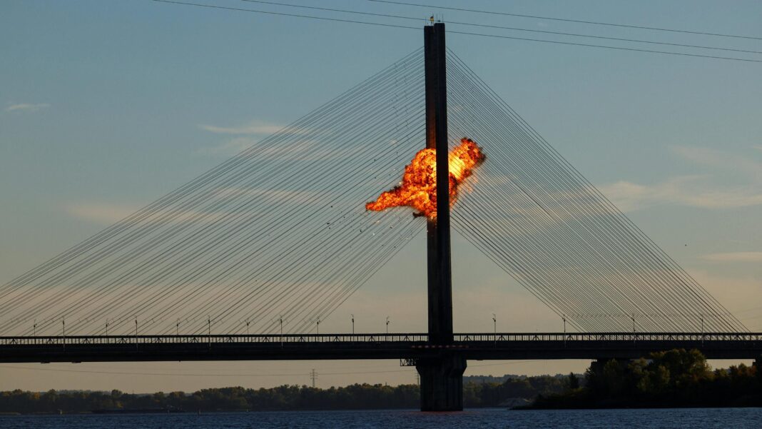 Russia hits second major bridge in Ukraine’s capital Kyiv A Russian drone explodes after hitting cables of Kyiv's Pivdennyi bridge. Photo: 2 October 2026