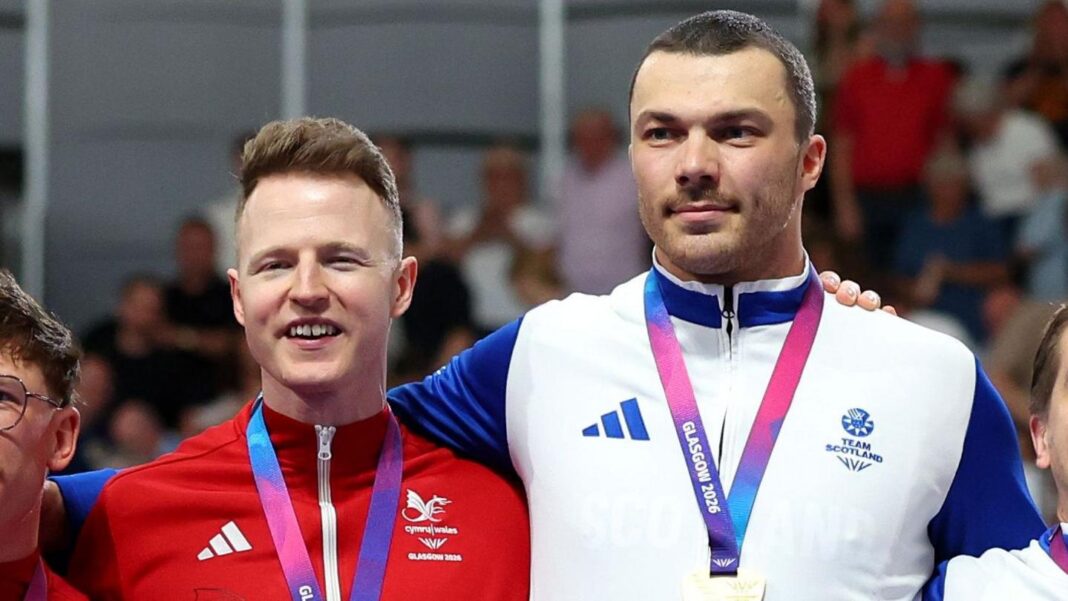 From rivals to team-mates – Ball links up with Pope James Ball and Aaron Pope on the podium at the 2026 Commonwealth Games