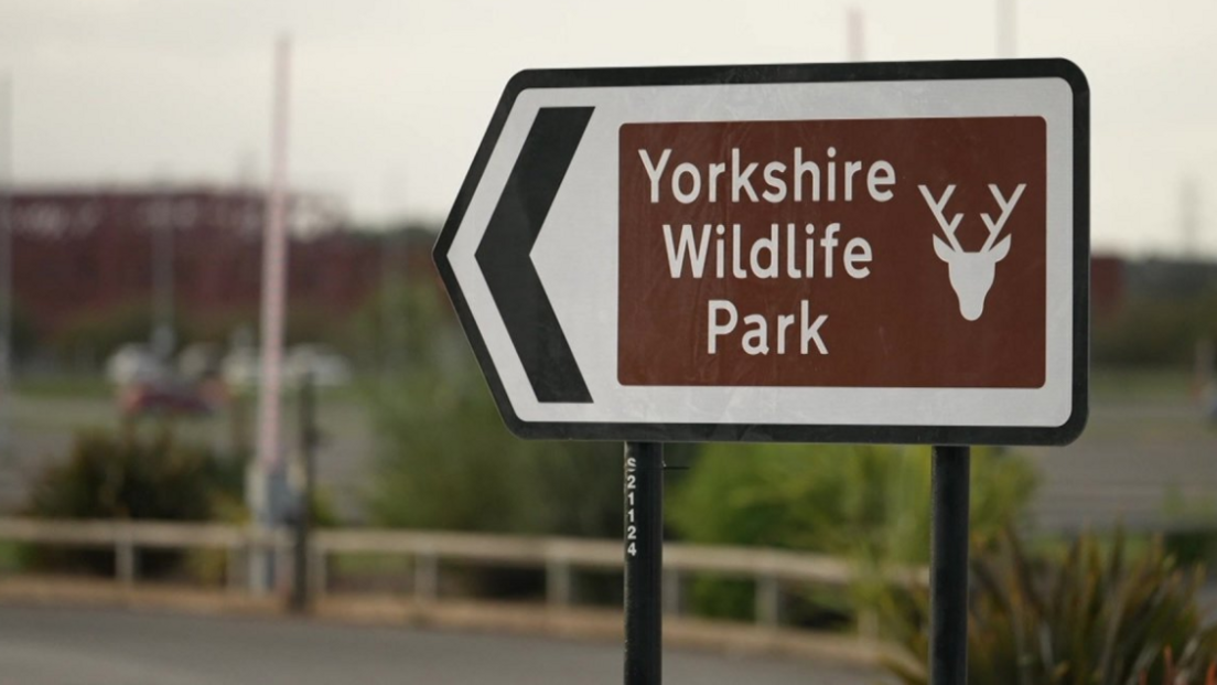 A brown sign outside Yorkshire Wildlife Park.