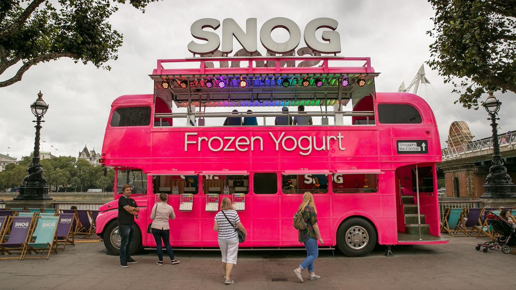 A bright pink bus selling Snog frozen yoghurt
